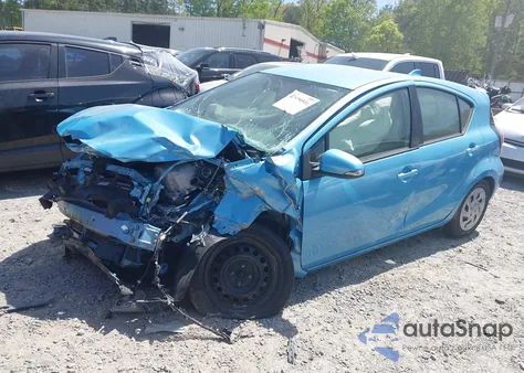 2016 Toyota Prius C One from USA, damaged, VIN JTDKDTB30G1139961